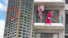 红衣女子高层阳台外跳舞坠楼身亡，附近居民：她住的民宿