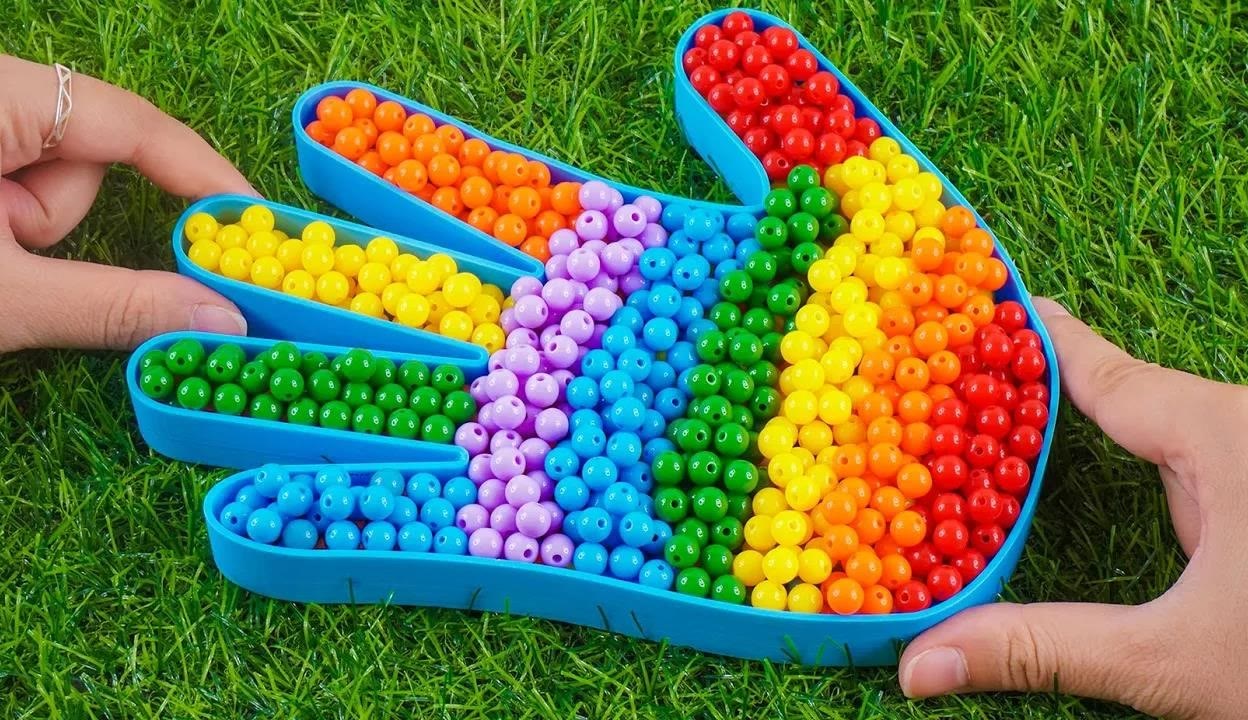 少儿益智玩具,玩手掌模具,放入彩色珠子